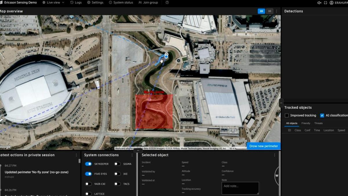 A screenshot of tracking software showing a map view of a stadium, a blue dot representing a drone and a red box indicating a no-fly zone.