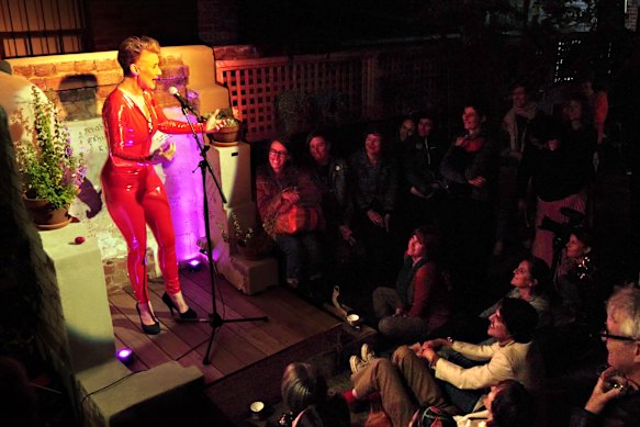 Maude Davey performs on the repurposed old dunny platform at La Mama Theatre.