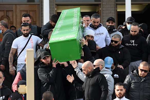 Mourners carry the coffin of Bilal Hamze after a service at Lakemba Mosque.