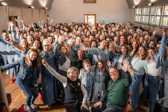 Helen and John Taylor, sitting at front, with Pitchface community choir including ABC newsreader Tamara Oudyn (standing front, fourth from right) at Pilgrim Uniting Church hall in Yarraville.