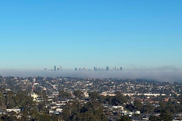 Fog hung over the city of Melbourne to start the last month of winter.