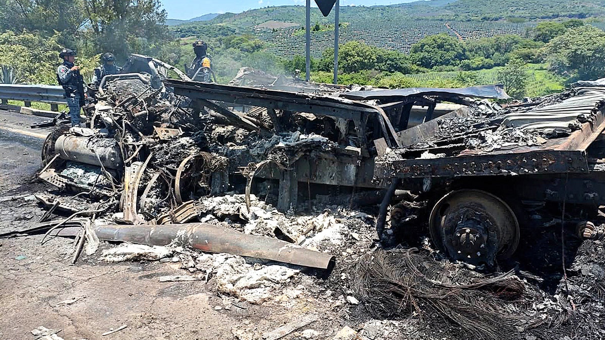 Burned wreckage of semi truck