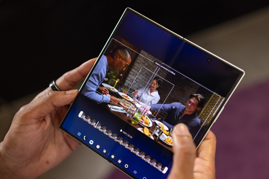 Image showing an AI cropping tool on a foldable phone
