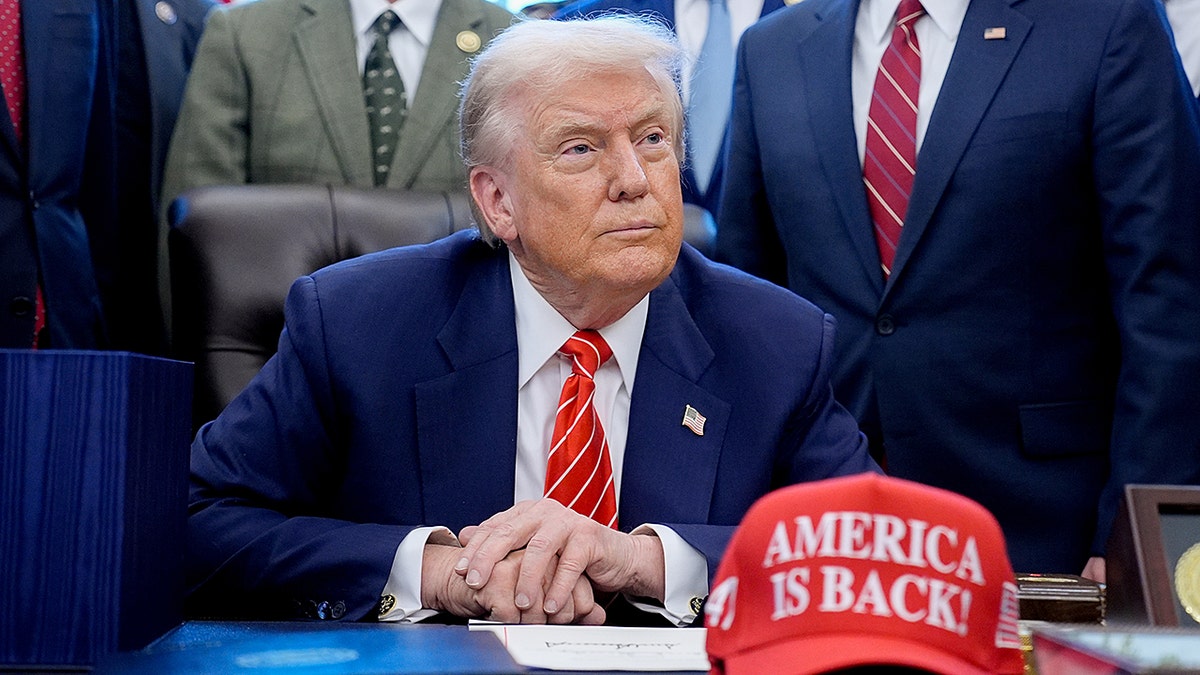 President Trump sits in Oval Office with 