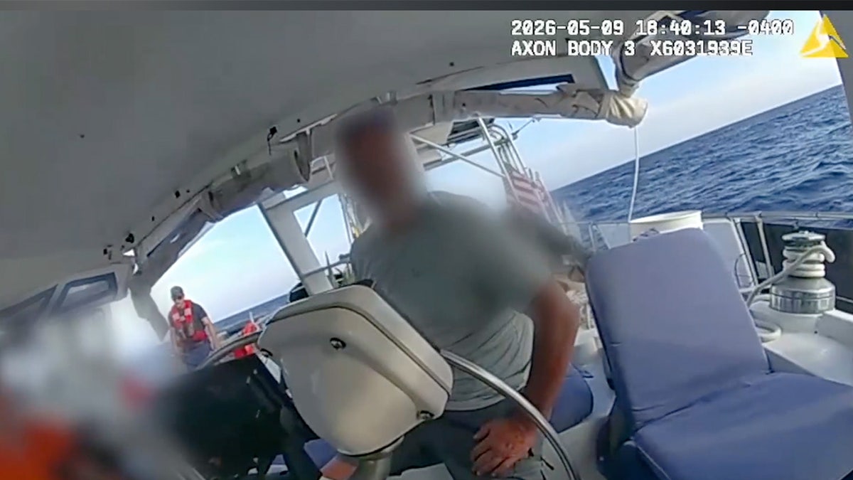 Image shows screenshot of boat being seized from bodycam video