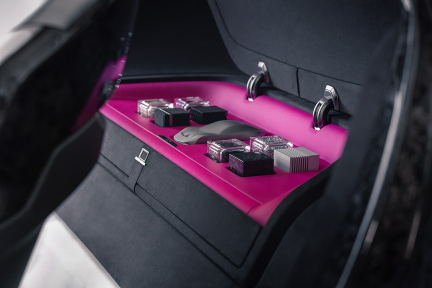 Material samples hidden beneath the concept car's rear seats