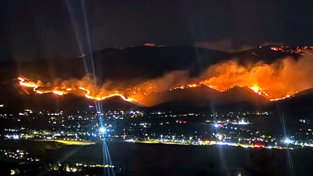 Nevada brush fire spreads to 10,500 acres as governor declares state of emergency