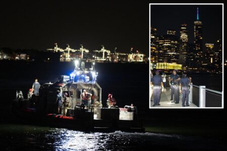 Boat overturns off Liberty Island coast; woman and child dead as more than a dozen pulled from water: sources