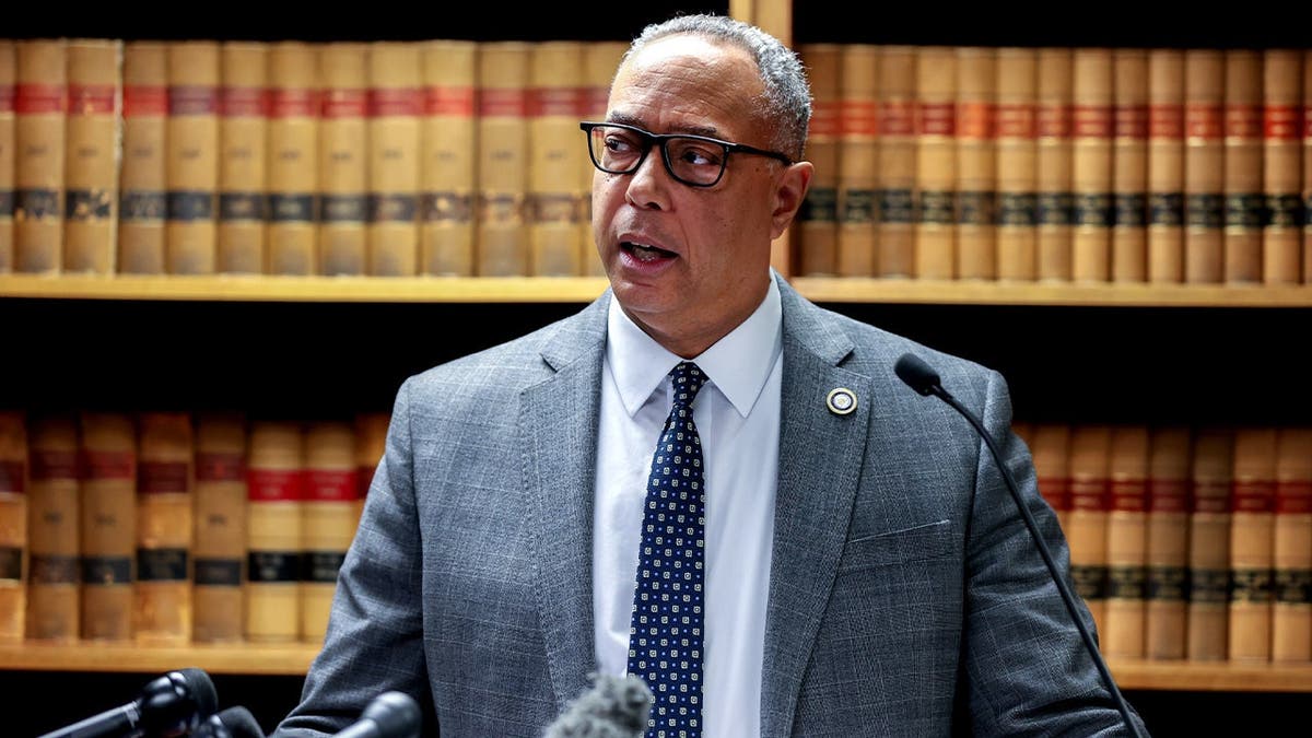 District Attorney Kevin Hayden speaks at a press conference