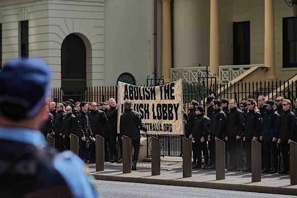 The National Socialist Network holds a rally outside parliament in Sydney.