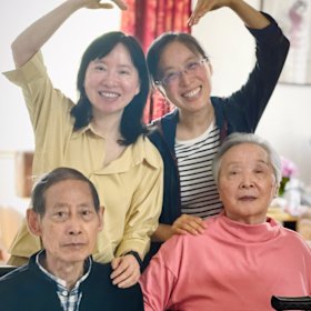 The author (at top right) with her parents and sister.