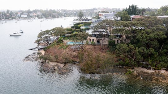 A tract of waterfront land has been cleared of hundreds of trees and plants.