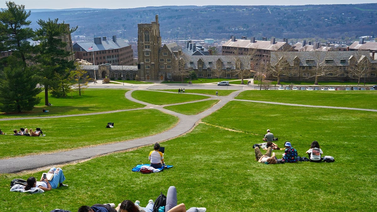 Students on Libe Slope at the Cornell University campus in Ithaca, US, on Tuesday, April 11, 2023.