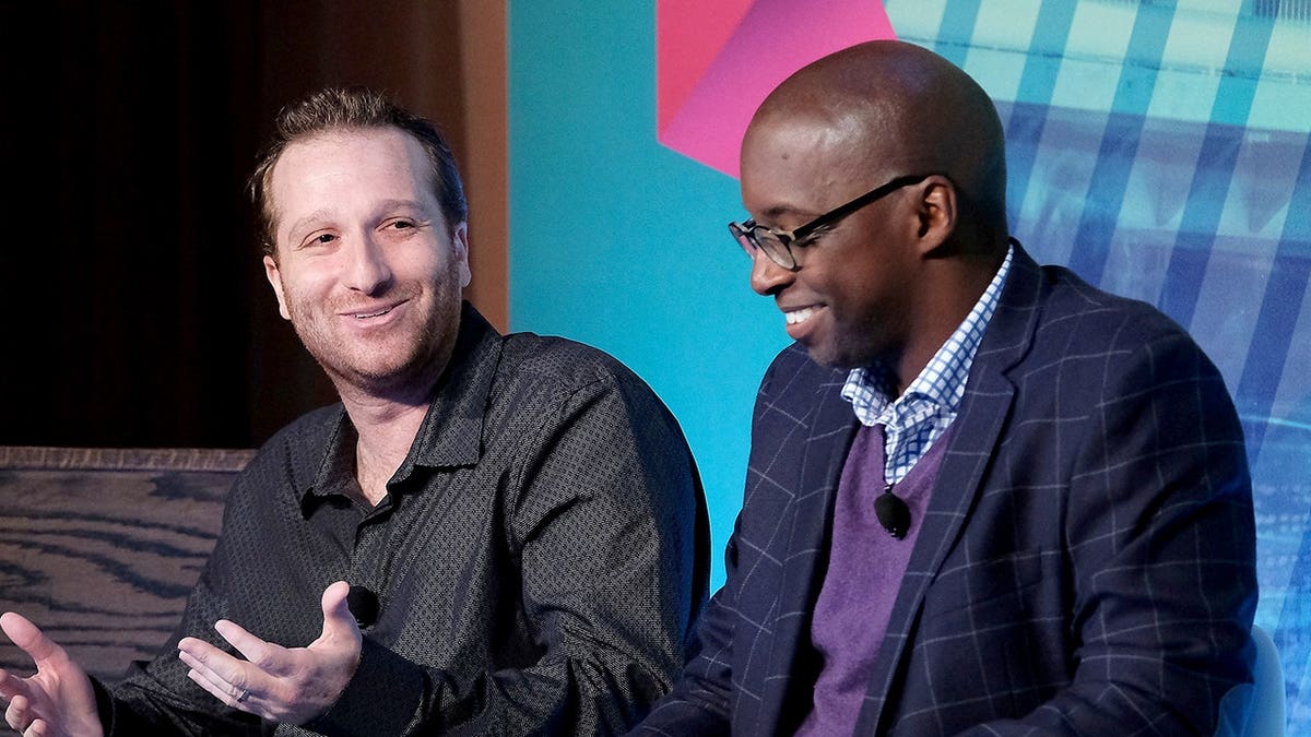 Evan Roberts and Michael Holley speak at a panel during Advertising Week in New York City.