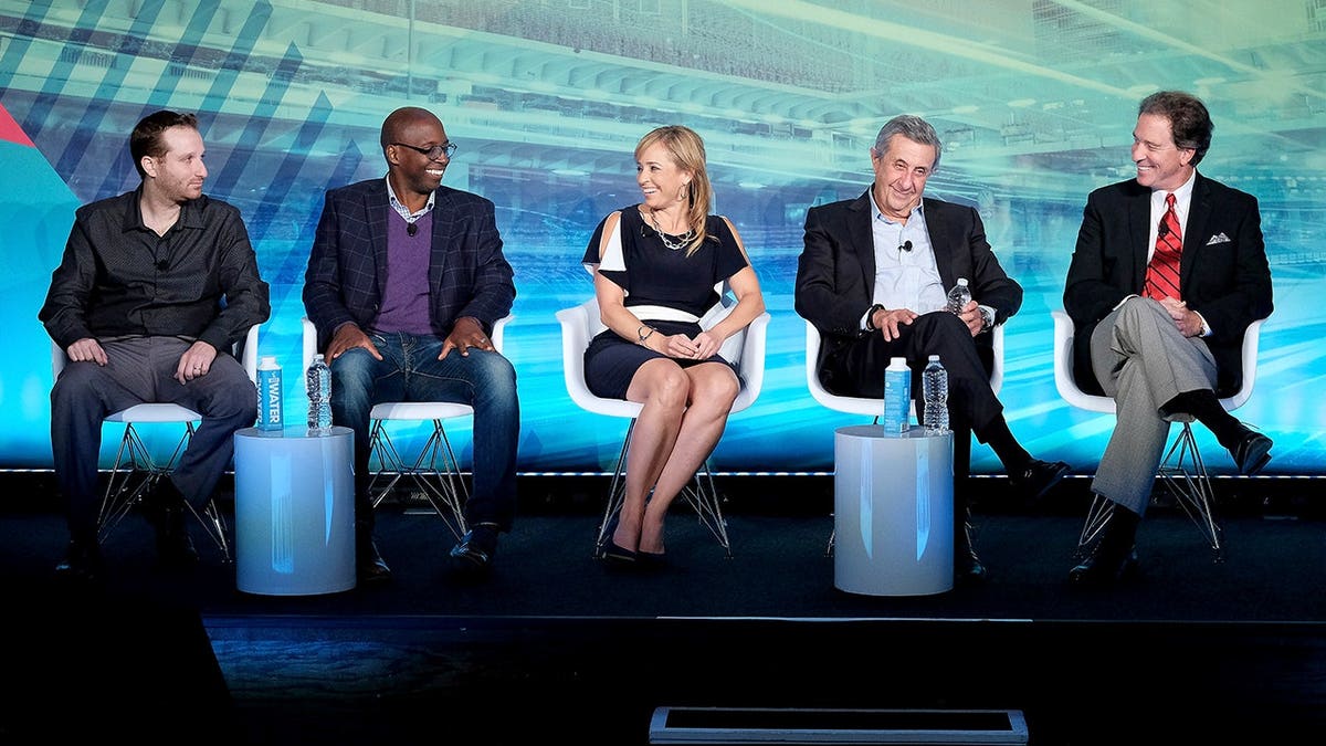 Michael Holley speaks onstage with other sports broadcasters at a panel during Advertising Week New York.