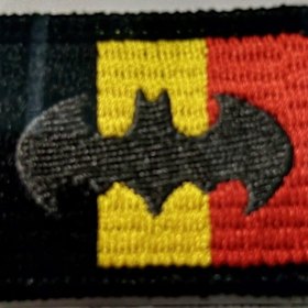 A cloth Batman badge with the Belgium flag designed to honour Vadim de Waart-Hottart by his colleagues.