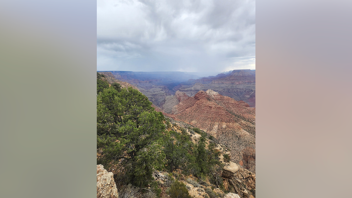 A view of the Grand Canyon under cloudy skies, shared by Texas chiropractor Dr. John Giusti during his hiking trip