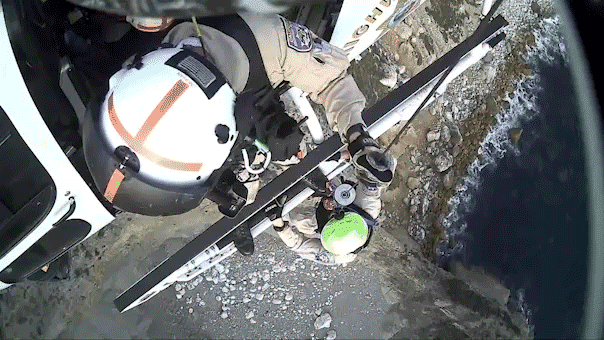 Helicopter rescue crew caught on camera saving 2 climbers trapped along popular California beach cliff