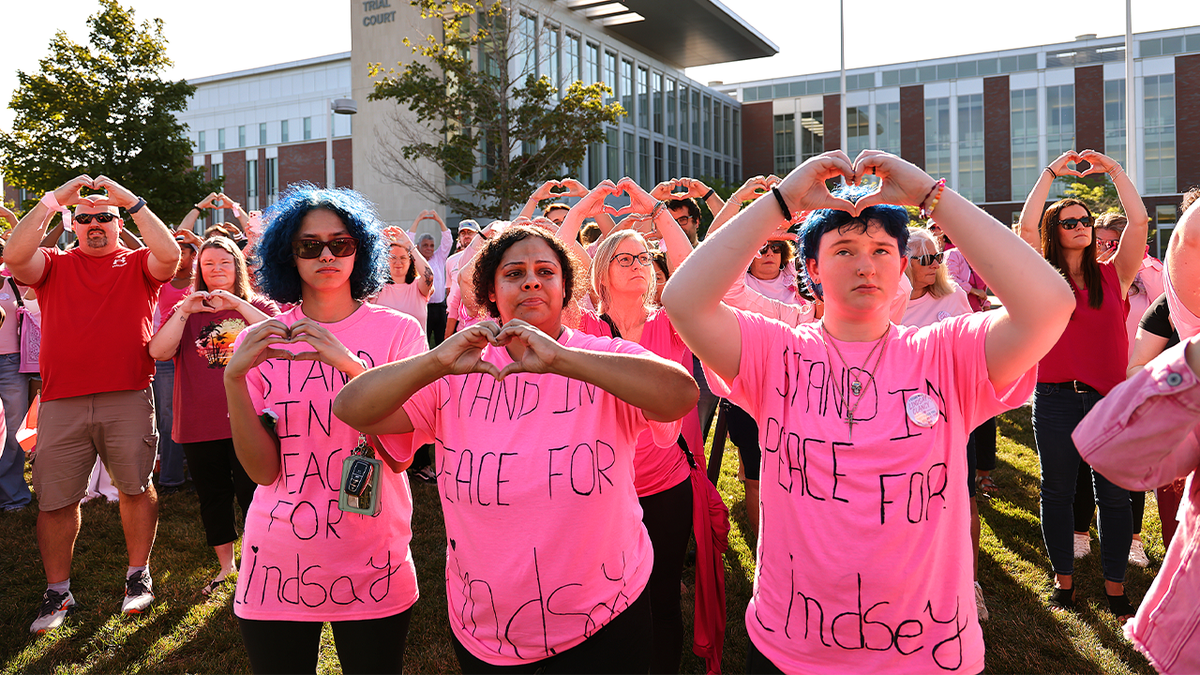 Supporters of Lindsay Clancy gather outside of Plymouth Superior Court on August 20, 2026, wearing pink