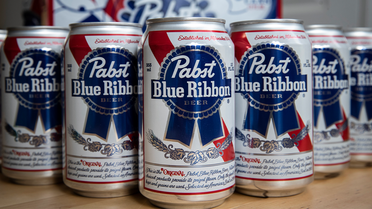 Rows of Pabst Blue Ribbon beer cans