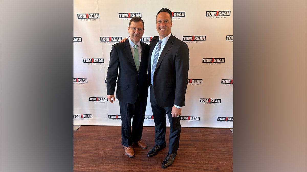 Rep. Tom Kean poses with MLB star and congressional candidate Mark Teixeira at his event in New Jersey on Aug. 21, 2026 - captiob