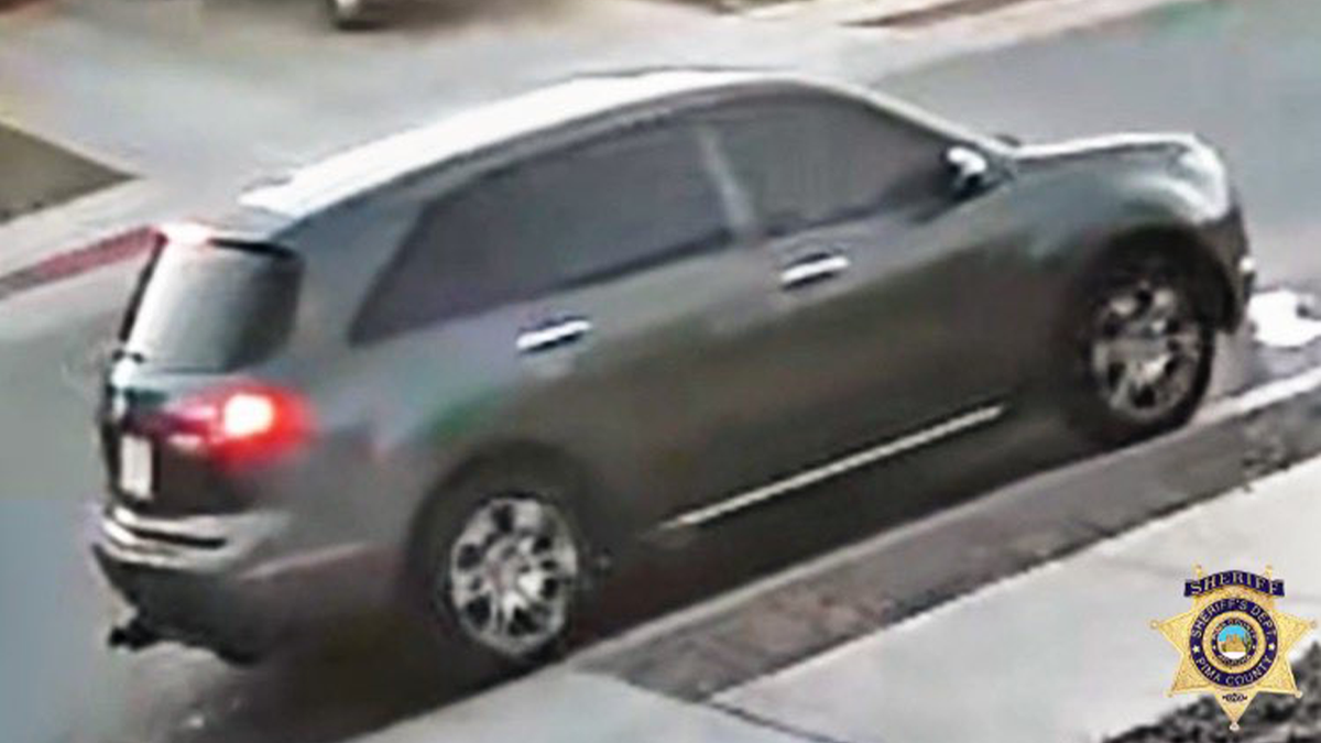 Authorities have described the suspect vehicle as a gray Acura MDX from between 2007 and 2013. The door over the gas cap may be missing. Two male suspects described as Hispanic, wearing all black with ski masks.
