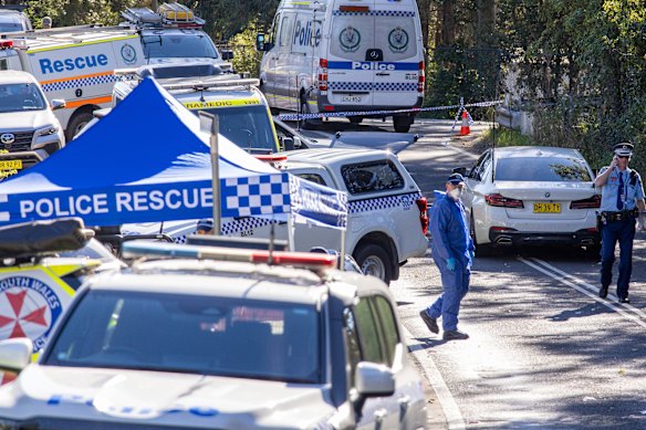 Police attend a crime scene on Waratah Road in the Blue Mountains suburb of Valley Heights after reports that a multiple stabbing incident had left one child dead and two other children and a woman in critical condition.