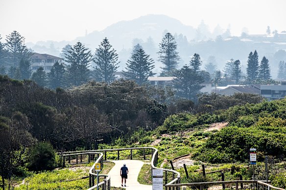 Smoke haze blows into Mona Vale from burn offs on Friday.