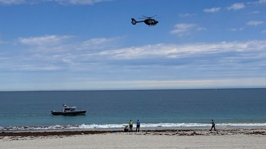 The scene at Sorrento Beach, in Perth’s north, on Friday morning after a suspected shark attack.