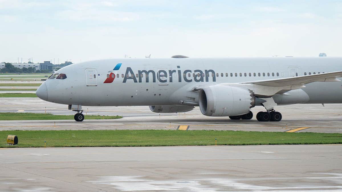 American Airlines passenger plane taxis on an airport runway