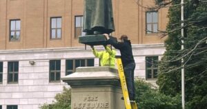 Century-old statue returned to its base in Memramcook, N.B. after vandalism