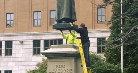Century-old statue returned to its base in Memramcook, N.B. after vandalism