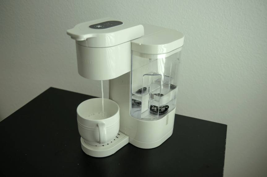 milk pouring out of white keurig