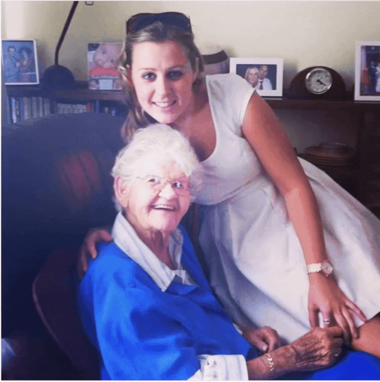 A gif showing a still photo of a young woman and an old woman animated by AI