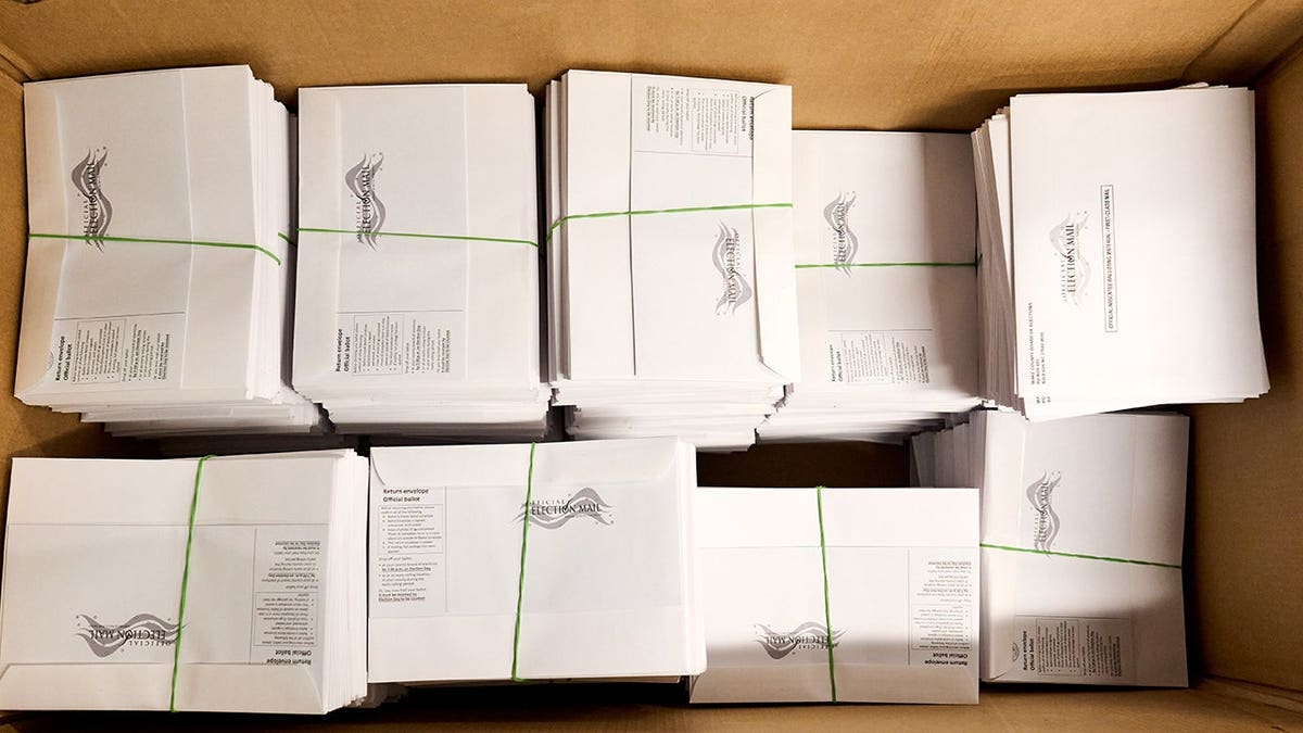 A large box of pre-assembled mail-in ballots sits at the Wake County Board of Elections.