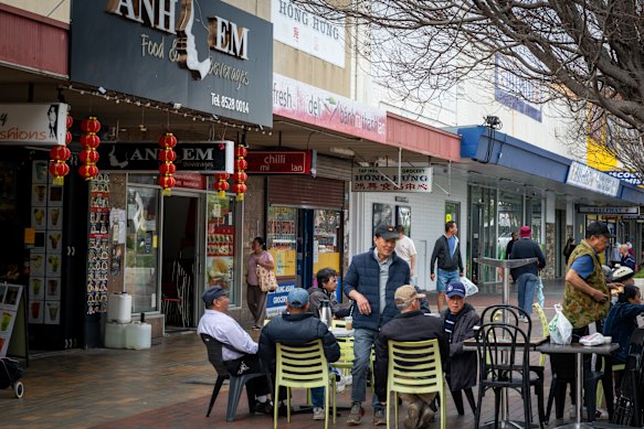 Locals gather on Hampshire Road on Friday morning.