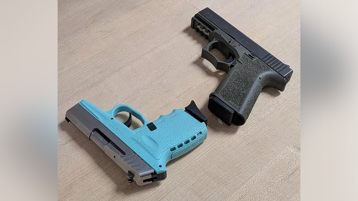 Two handguns displayed after a federal drug investigation in California