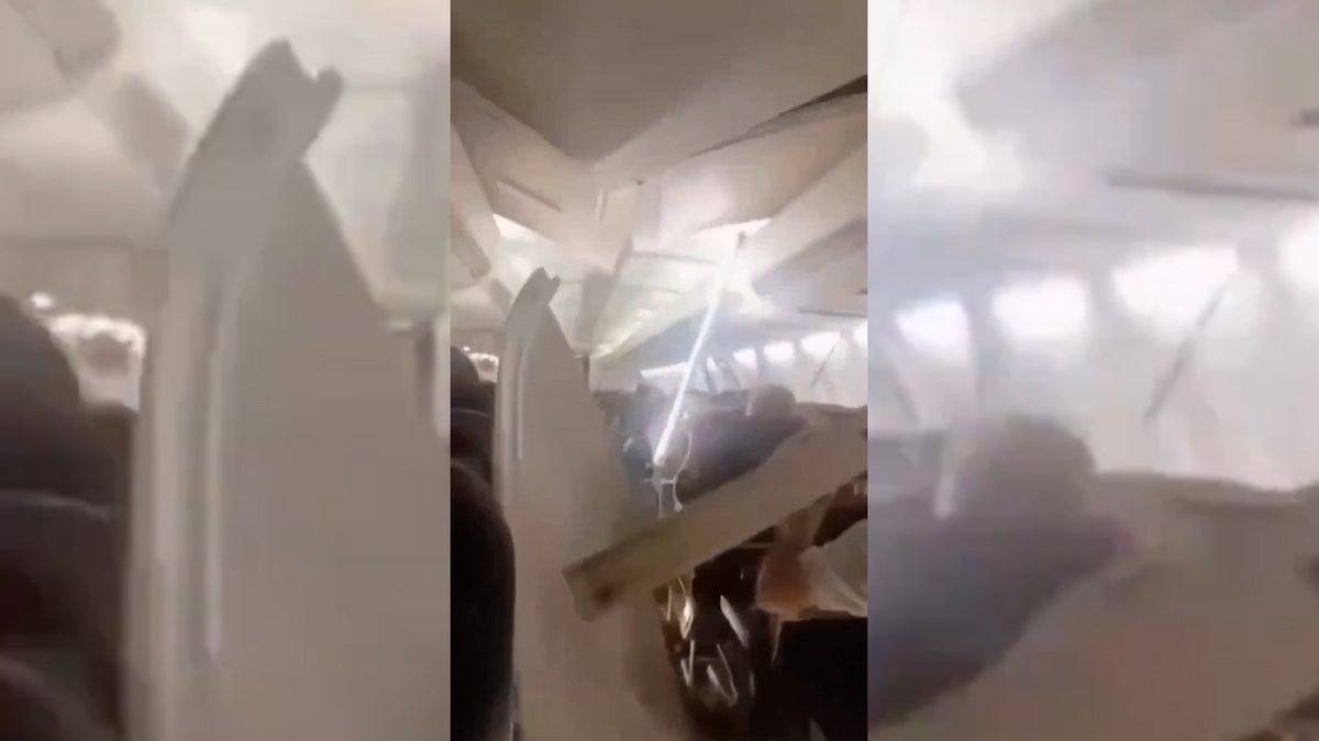 Damaged airplane ceiling panels dangling