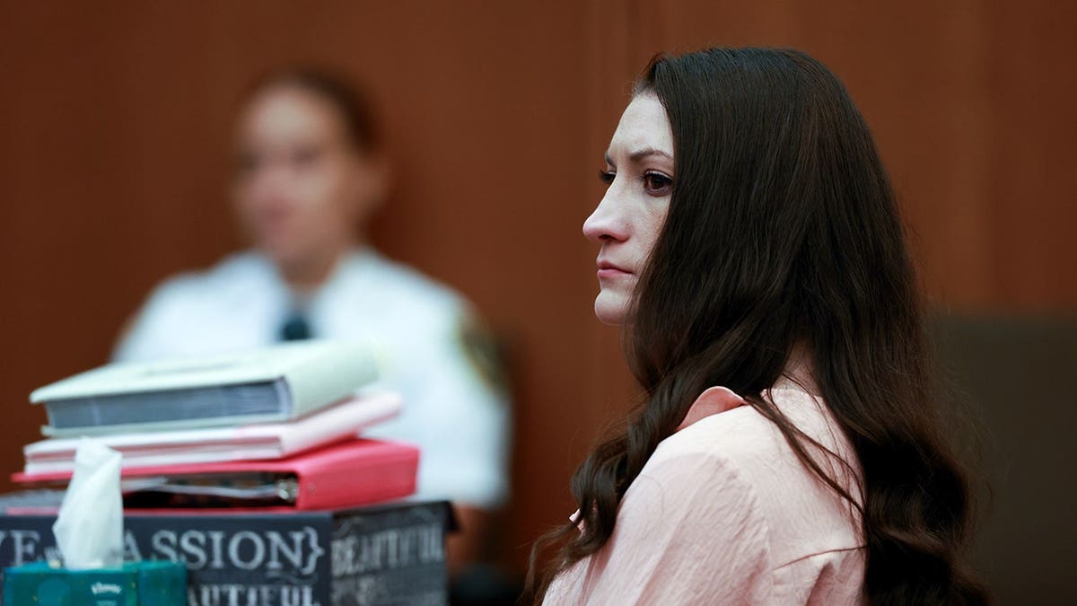 Lindsay Clancy listens to testimony in Plymouth Superior Court.