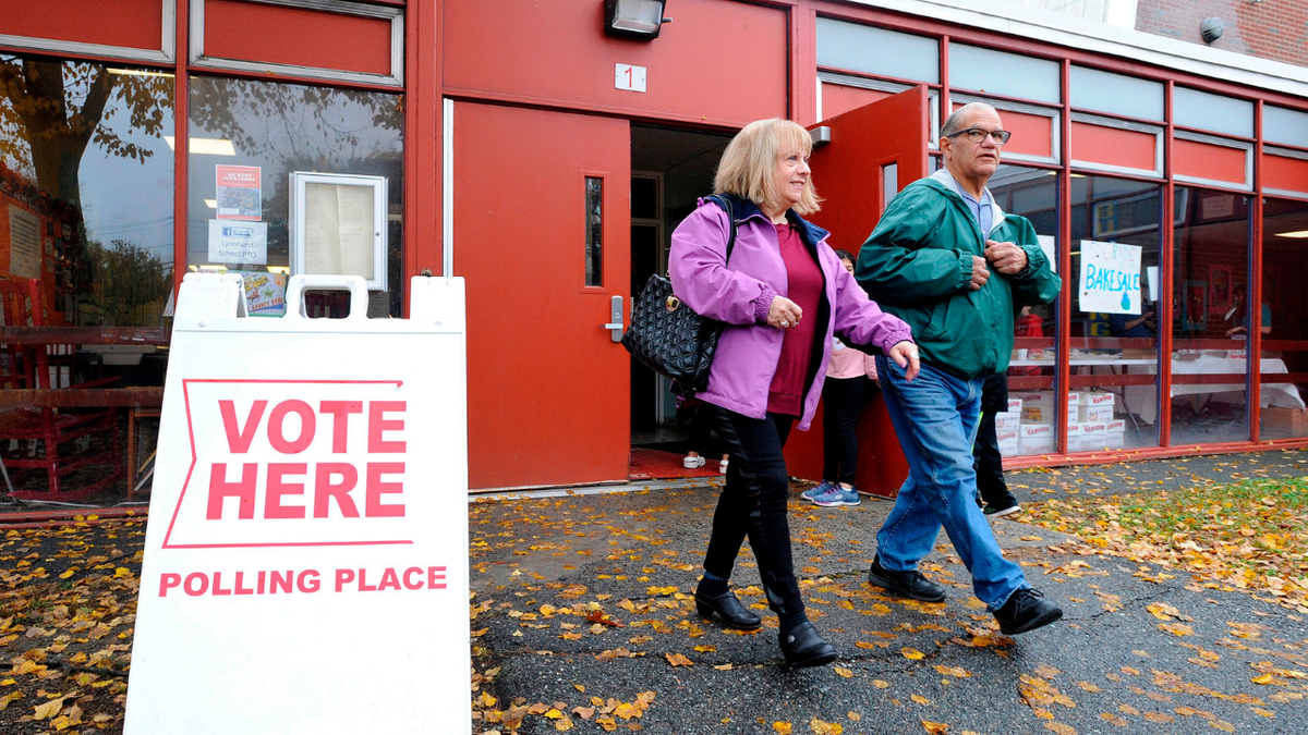 Voters leave a polling location at Saugus Lynnhurst Elementary School in Marblehead, Massachusetts, on Election Day.