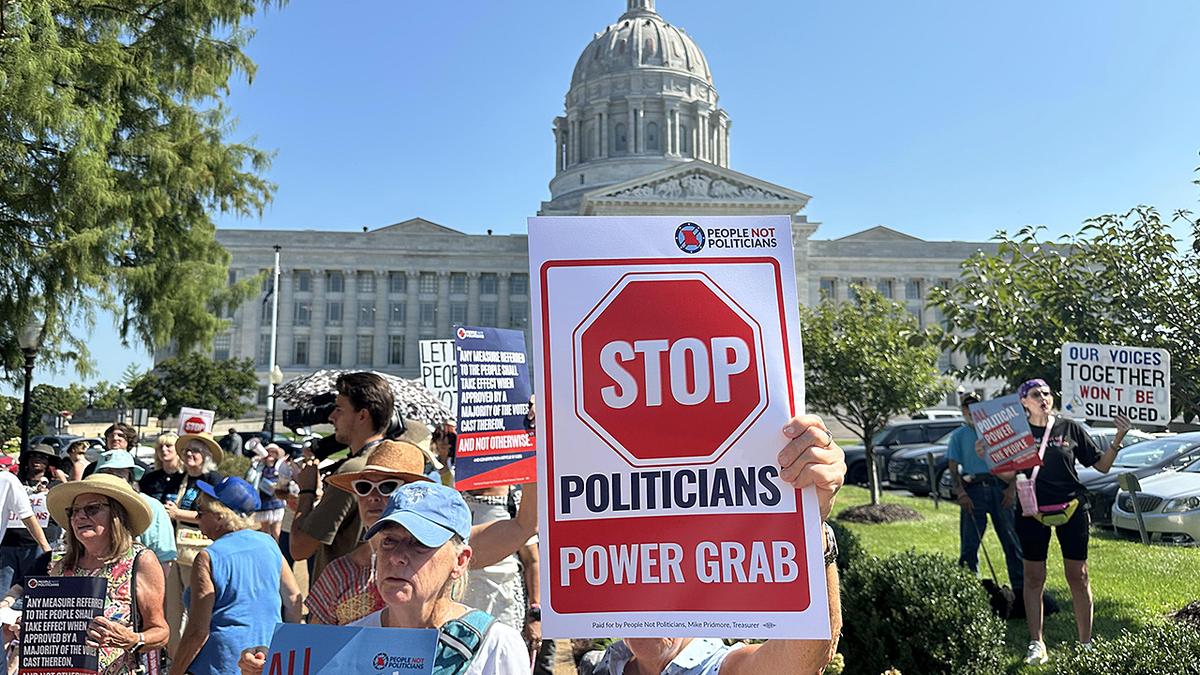 People opposed to a congressional redistricting plan rally outside the Missouri Capitol in Jefferson City